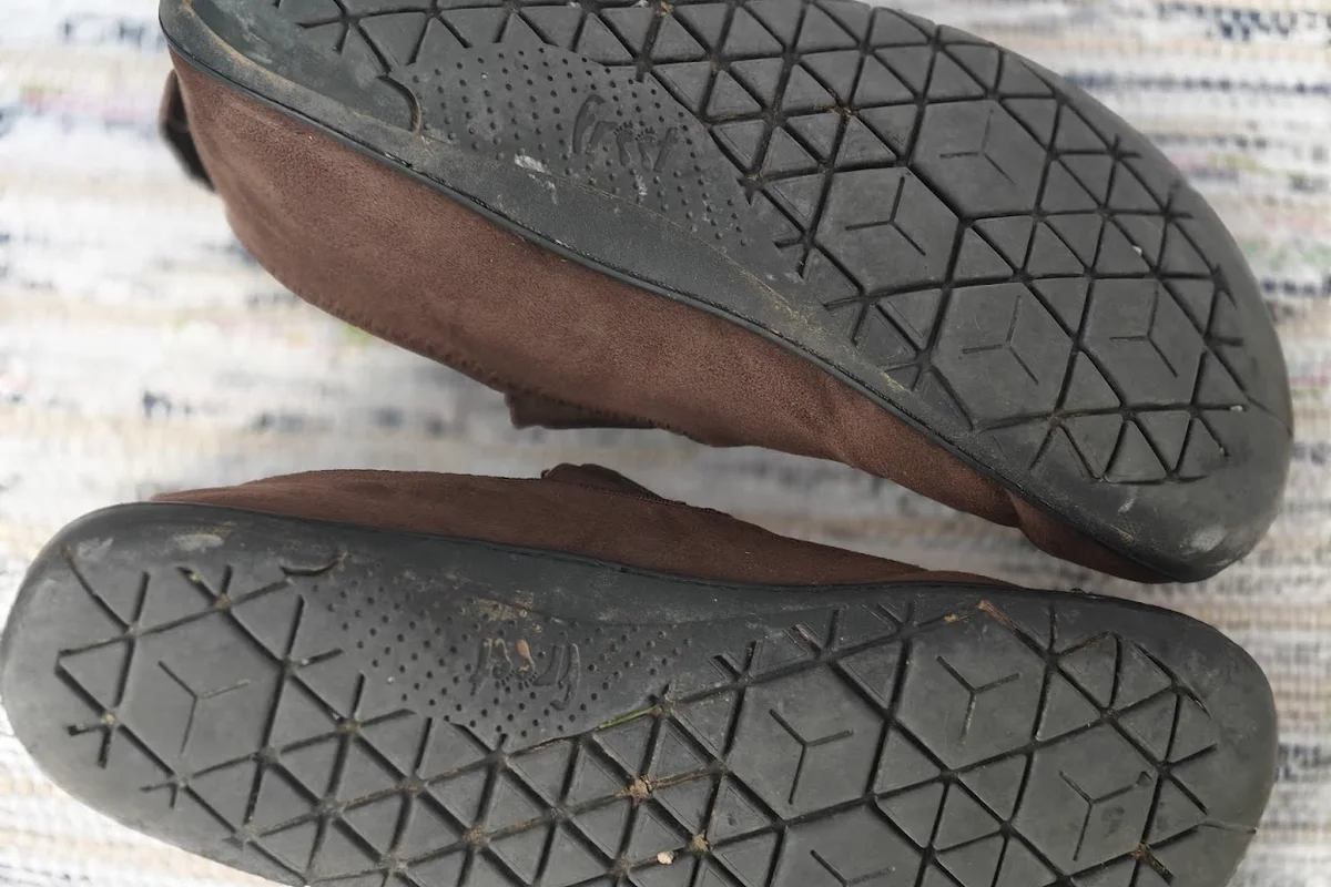 Worn tread on the outsoles of a real pair of Freet Mooch barefoot shoes