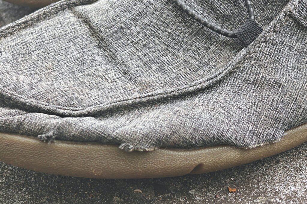 Close-up of fraying where the upper meets the sole on a Xero shoe