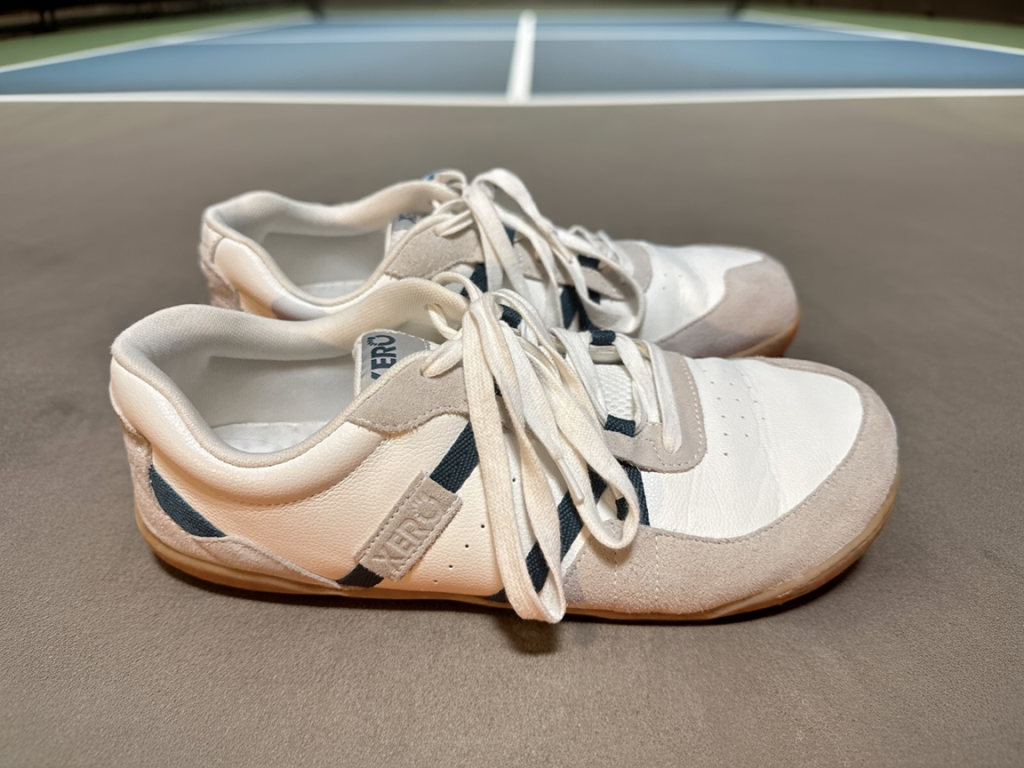 the xero shoes kelso next to a pickleball court