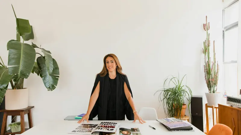 Office professionals working at standing desk showing corporate environment for barefoot dress shoes