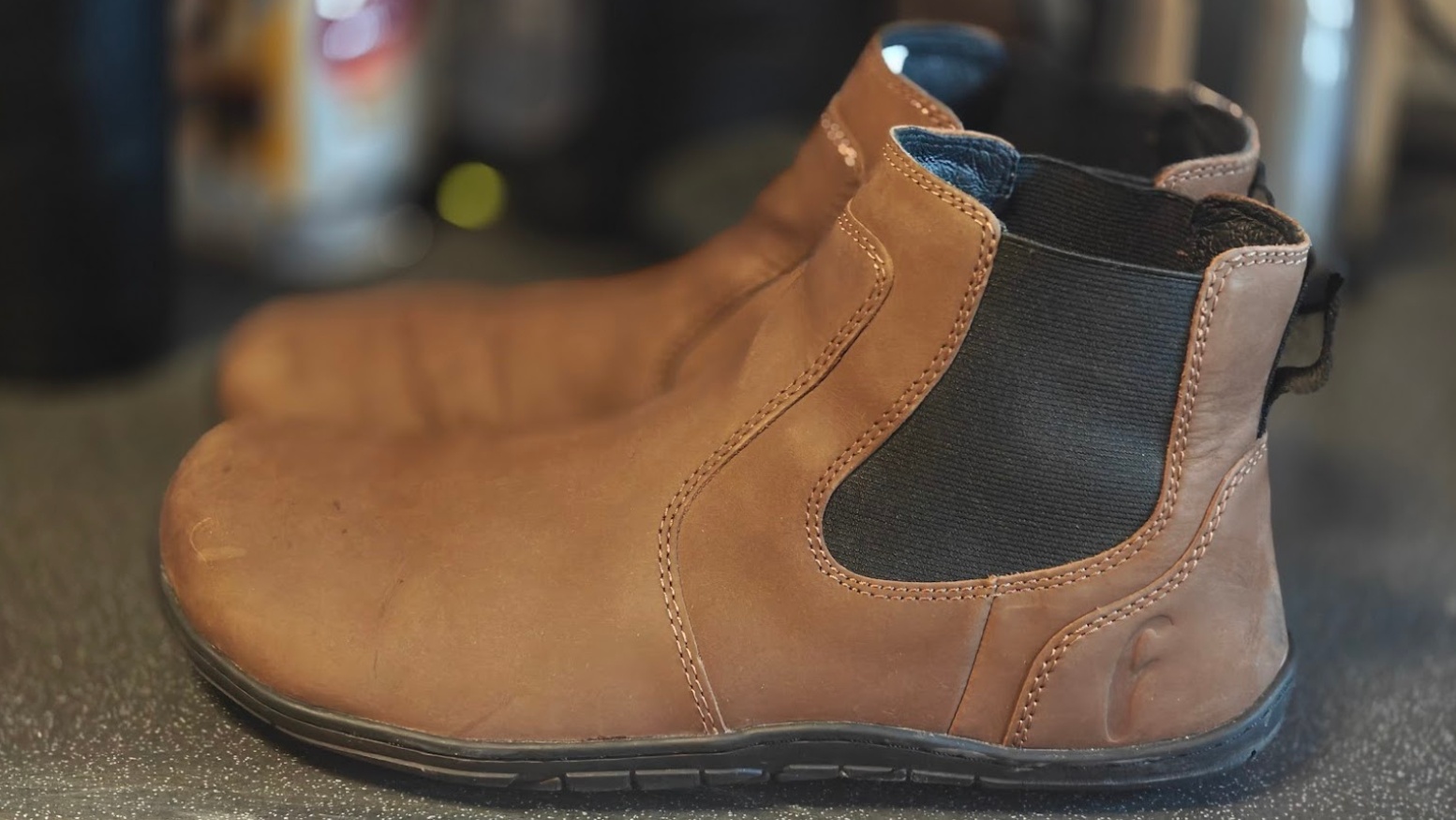 Freet Durham barefoot Chelsea boot side profile on concrete ledge