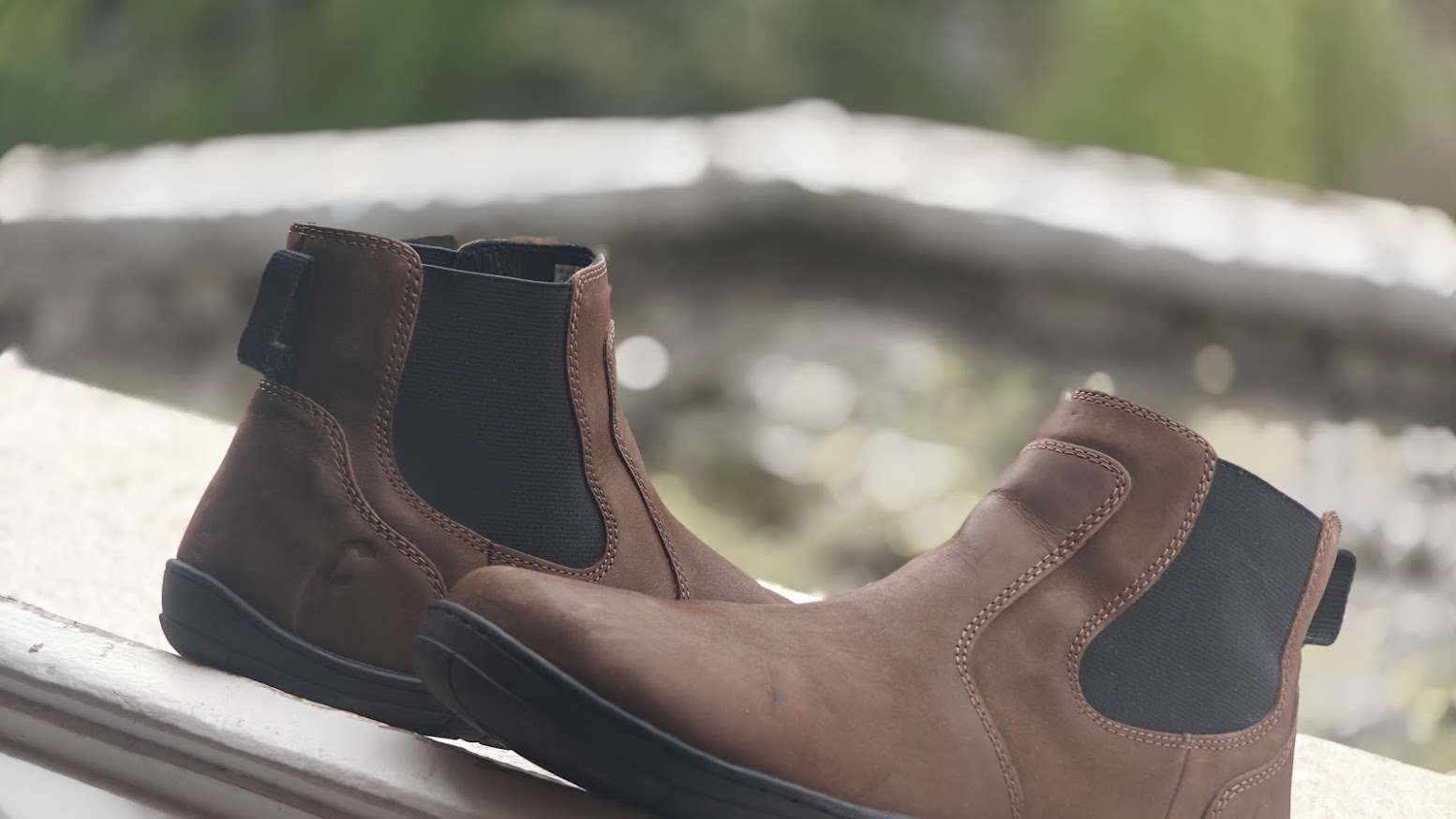 Freet Durham barefoot Chelsea boots on outdoor railing during daily wear test
