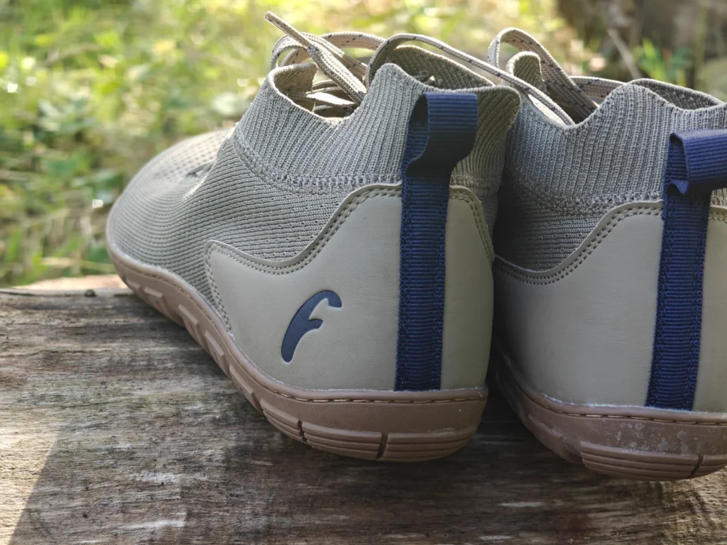 Freet Danum: Heel overlays and blue pull tabs.