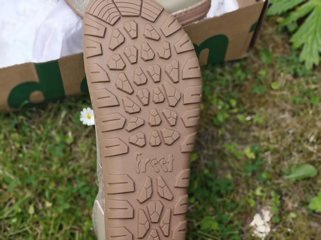 Underside of the Freet Danum gum rubber HillGrip outsole showing multi-directional lugs and freet footprint logo.