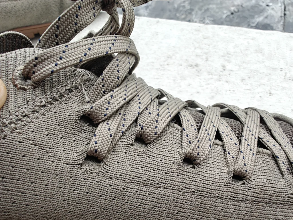 Close-up view of the Freet Danum upper eyelet stitching and patterned laces.